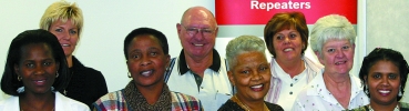 Back row: Lee-Ann, Mike and Eileen Andreka.
Front row: Marilyn Shoke (coding), Agnus Mabitle (production), Iris Pillay (production), Sheila Oakes (accounts) and Kanikram Chetty (coding) all received recognition for 10 years of dedicated service to RDC